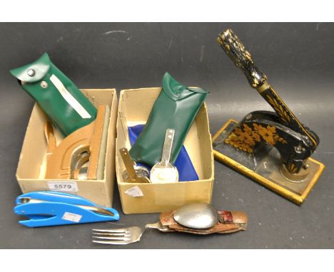 A vintage folding utility knife, assorted blades including spoon, fork, etc.; a Victorian stamp press; others, later; etc.; q