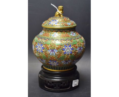 A Chinese Cloisonne vase and cover, with stylised lotus, foliage and scrolls, in coloured enamels, domed cover, lion finial,2