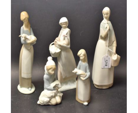 A Nao type figure, of a farmer's wife; others, similar, including matt and glazed; Lladro; etc. (5)