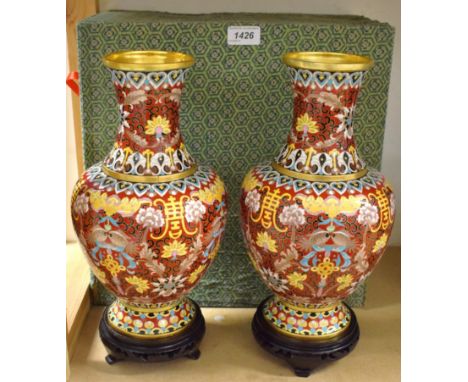 A pair of Chinese cloisonne enamel vases, boxed