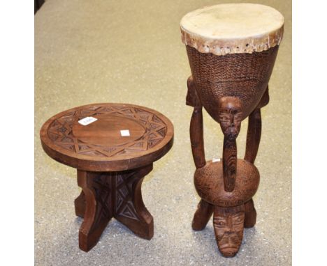 A tribal drum; a small carved tripod table (2)