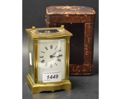A lacquered brass five glass carriage clock, white enamel dial, Roman numerals, leather carry case, late 19th century