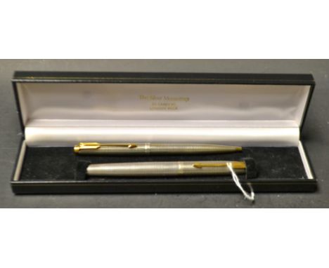 A Parker sterling silver fountain pen and ball point pen set, sterling silver Tiffany Grid patterned body's stamped sterling,