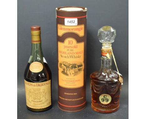 A bottle of Glenmorangie 10 year old malt Scotch whisky; a bottle of Gaston Lagrange champagne cognac; a bottle of C99 brandy