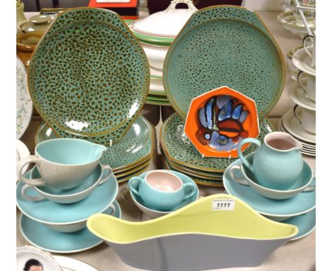 A set of ten Poole pottery Aegean mockled green plates; others similar; an abstract heptaganol dish; two tone table ware.