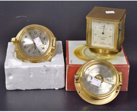 A four sided desk clock, thermometer, hydrometer, etc., retailed by Sewills; nautical barometer and clock (3)
