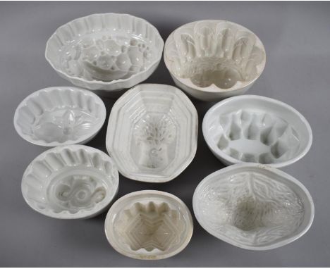 A Collection of Late 19th and Early 20th Century White Glazed Ceramic Jelly Moulds 