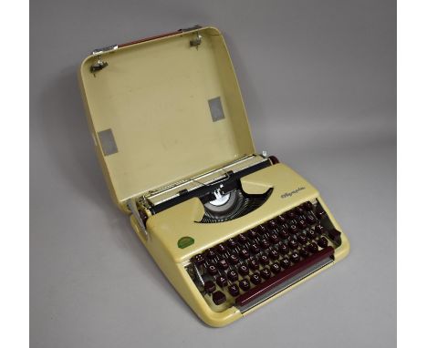 A Vintage Olympia Portable Manual Typewriter 