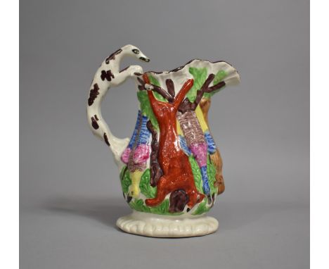 A 19th Century Relief Decorated Game Jug 