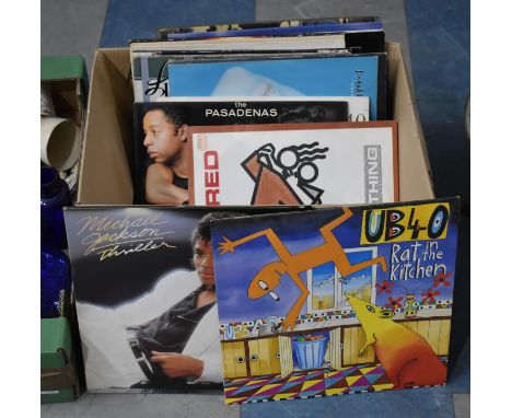 A Collection of 33rpm Records to Include Michael Jackson, Simply Red, UB40 etc 