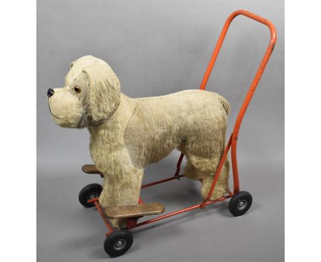A Vintage Childs Push Along and Ride on Dog Toy 