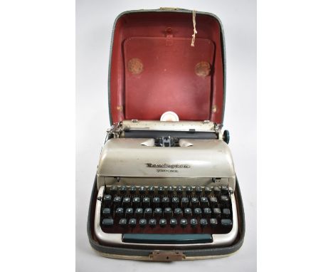 A Vintage Cased Remington "Quiet Riter" Portable Manual Typewriter 