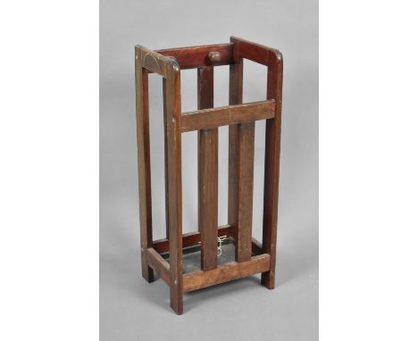 An Edwardian Wooden Stick Stand with Metal Drip Tray, 25cm wide and 55cm high 