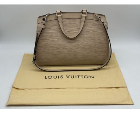 Louis Vuitton Brea MM Beige EPI Leather Handbag. 
Excellent Condition, as new, flawless inside and out. 