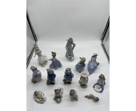 Collection of Thirteen NAO Figurines and one another. 
Good condition, no damage. 