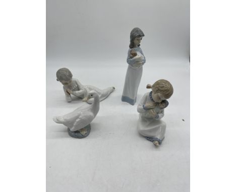 Collection of four NAO figurines. 
Good condition, no damage. 