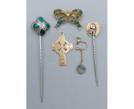 A yellow metal brooch of bow form set with Torquoise and pearl together with a similar earclip, two stick pins and a 15ct gol