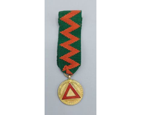 A 9ct gold National Safety First Association Medal for 10 years freedom from accident medal, 4.1gms 