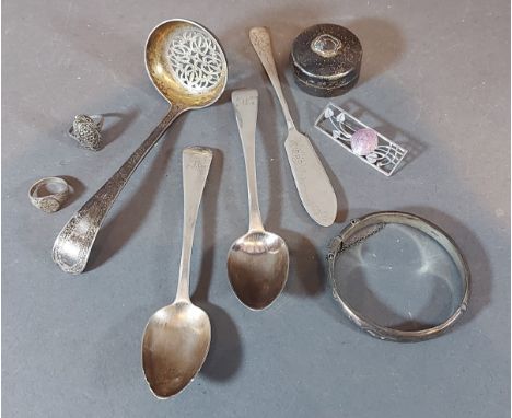 A Victorian silver sugar sifter spoon together with a silver bangle and various small items of silver 