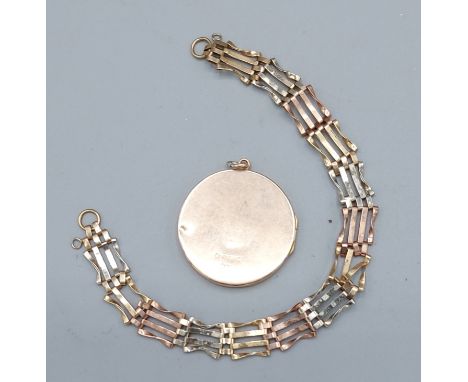 A 9ct gold pendant locket together with a 9ct gold gate link bracelet, 8.7gms 