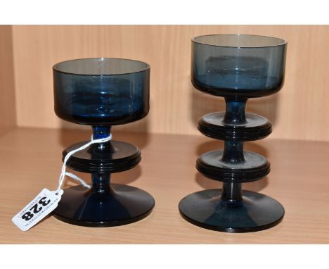 TWO MID CENTURY WEDGWOOD NAVY GLASS CANDLESTICKS, comprising two blue glass Sheringham candlestick holders by Ronald Stennett