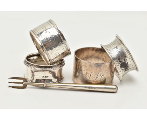 A SELECTION OF SILVER ITEMS, to include four single napkin rings of various designs, each with a full British hallmark for Bi
