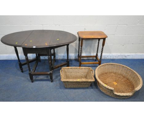 A 20TH CENTURY OAK GATE LEG TABLE, raised on turned supports, open width 132cm x closed width 45cm x depth 84cm x height 78cm