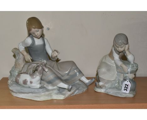 A LARGE LLADRO PORCELAIN FIGURE OF 'GIRL WITH GOAT' 1004756, designed by Fulgencio Garcia 1971-1978, together with a Nao figu