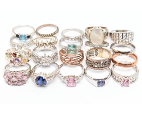 A BAG OF TWENTY RINGS, to include eighteen white metal rings of various designs, most stamped 925, some set with cubic zircon