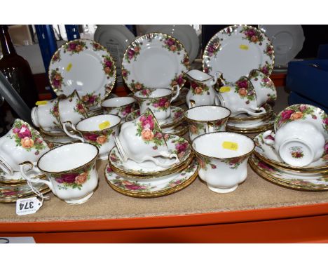 A GROUP OF ROYAL ALBERT OLD COUNTRY ROSES TEAWARES comprising twelve tea cups, twelve saucers, twelve side plates, twelve tea