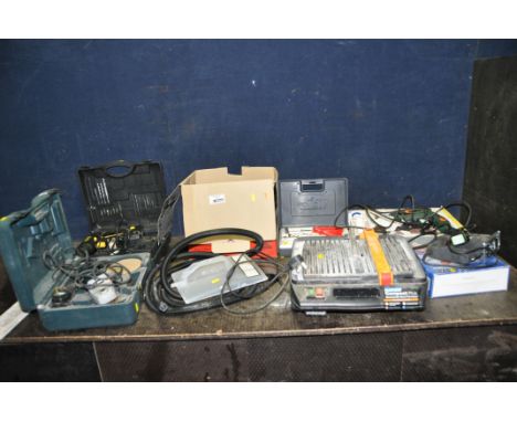 A COLLECTION OF POWER TOOLS including a Bosch CSB-550-2 drill, a Black and Decker angle grinder, a McKellar cordless drill wi