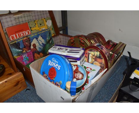 ONE BOX AND LOOSE VINTAGE TINS AND GAMES etc., to include a brown leather trunk, cigarette cards, Cluedo, What am I bid? game