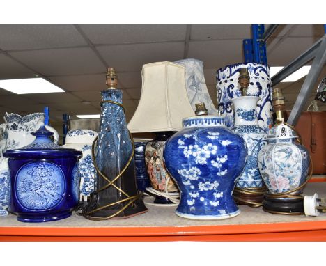 A COLLECTION OF TALL ITEMS AND LAMPS, to include a small oriental blue ceramic table lamp, pattern birds and blue and pink fl