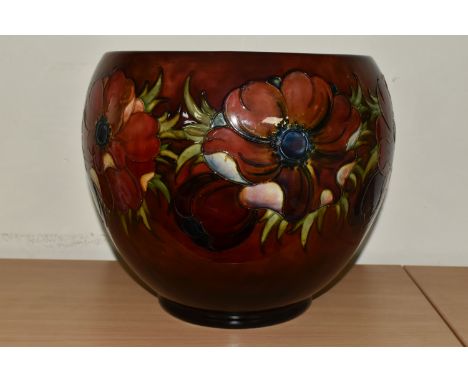 A MOORCROFT POTTERY 'ANEMONE' PLANTER,  decorated with red and mauve anemone flowers on a deep red ground, William Moorcroft 