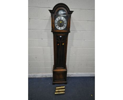 A 20TH CENTURY OAK LONGCASE CLOCK, the arched glass door enclosing a 9.5 inch brass and silvered dial, signed Tompora Fecit, 