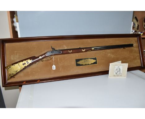 A FRANKLIN MINT REPLICA 'OLD BETSY, DAVY CROCKETT'S .41 CALIBER RIFLE' on a wooden display board, with inlaid moon and star d