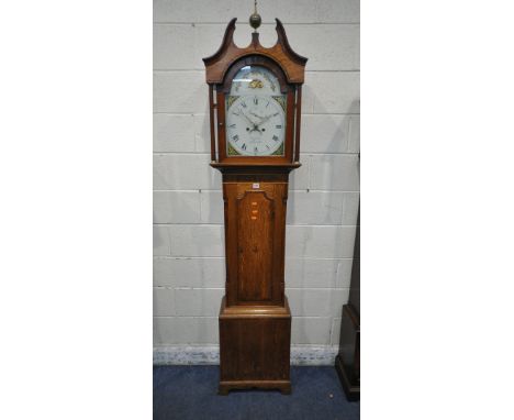 A GEORGIAN OAK CASED EIGHT DAY LONGCASE CLOCK, with scrolled pediment, flanking a brass finial, the arched glass door enclosi
