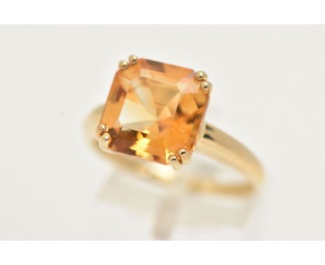 A 9CT SINGLE STONE RING, a square cut Citrine, prong set in yellow gold, hallmarked 9ct Birmingham, ring size R, approximate 