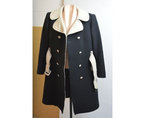 A quantity of vintage clothes to include c1940s blouses, taffeta skirts, a black taffeta coat dress with abstract trim, a c19