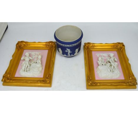 An Adams blue and white Jasperware bowl/jardinière, and two relief Dresden panels 'Scene from the Castle Park of Sanssouci' a