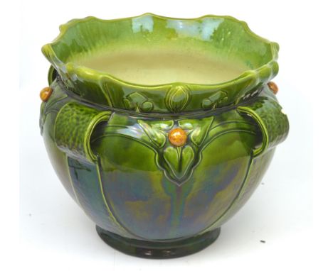 An Art Nouveau green ground Bretby ceramic planter, diameter approx 40cm (af).   CONDITION REPORT  Large crack, visible insid