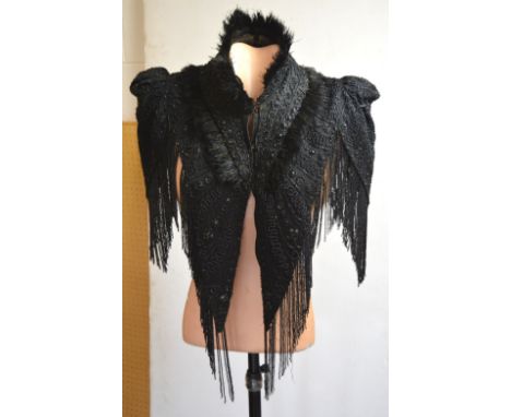 Two Victorian evening capes; a shoulder cape with swansdown decoration to the collar, heavily beaded with circular and bugle 