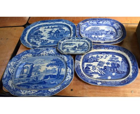 A quantity of late 19th and early 20th century blue and white meat plates to include a Spode example, various Willow Pattern 