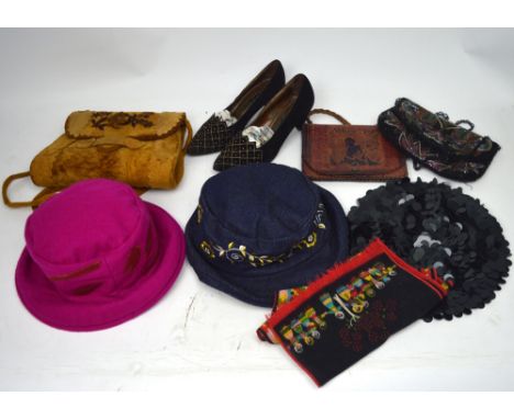 A quantity of vintage items to include a heavy bugle beaded evening bag, an embossed Indian leather handbag, an appliqué sued