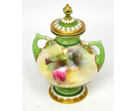 A Royal Worcester twin-handled lidded vase with rose decoration, initialled 'CH' to base, possibly Henry Chair.   CONDITION R