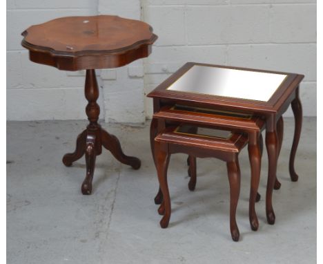 A reproduction Sorrento-style inlaid lamp table, height approx 64cm and a nest of three graduated reproduction mahogany occas
