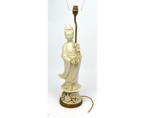 A blanc de Chine Guanyin on lotus pad lamp, height approx 60cm.