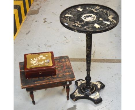 A mother of pearl inlaid lacquered lamp table on quatrefoil supports together with a Shibayama-mounted lacquered sewing box a