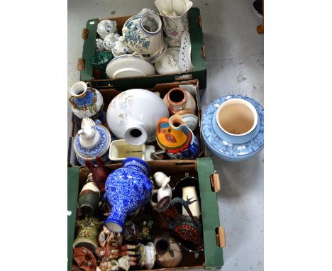 A large quantity of ceramics to include a set of Delft-style Continental lidded storage jars, a large Denby 'Dauphine' squat 