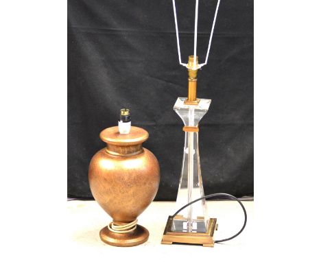 An acrylic and bronzed table lamp with cream silk shade, height 81cm and a bronzed ceramic baluster-shaped table lamp (2).